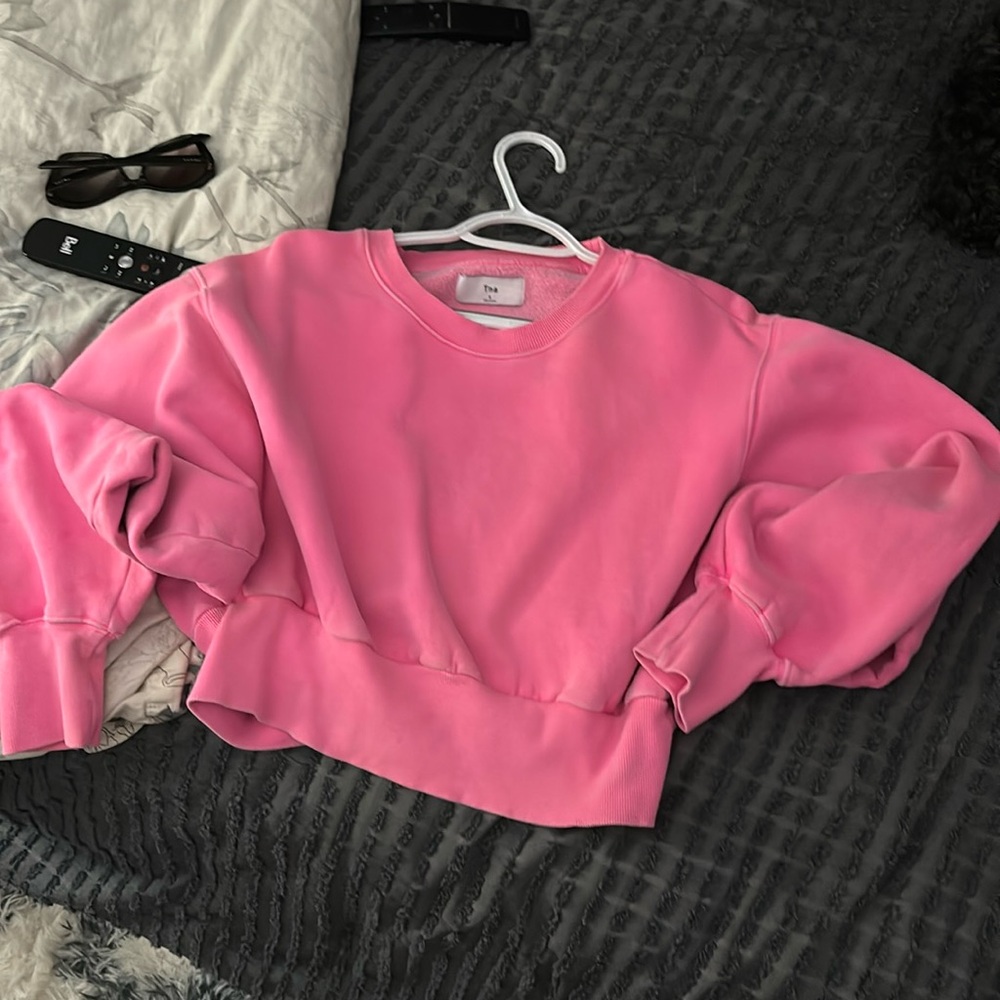 TNA bright, pink cropped sweatshirt